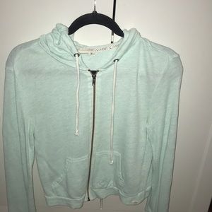 Light blue zip up cropped sweater